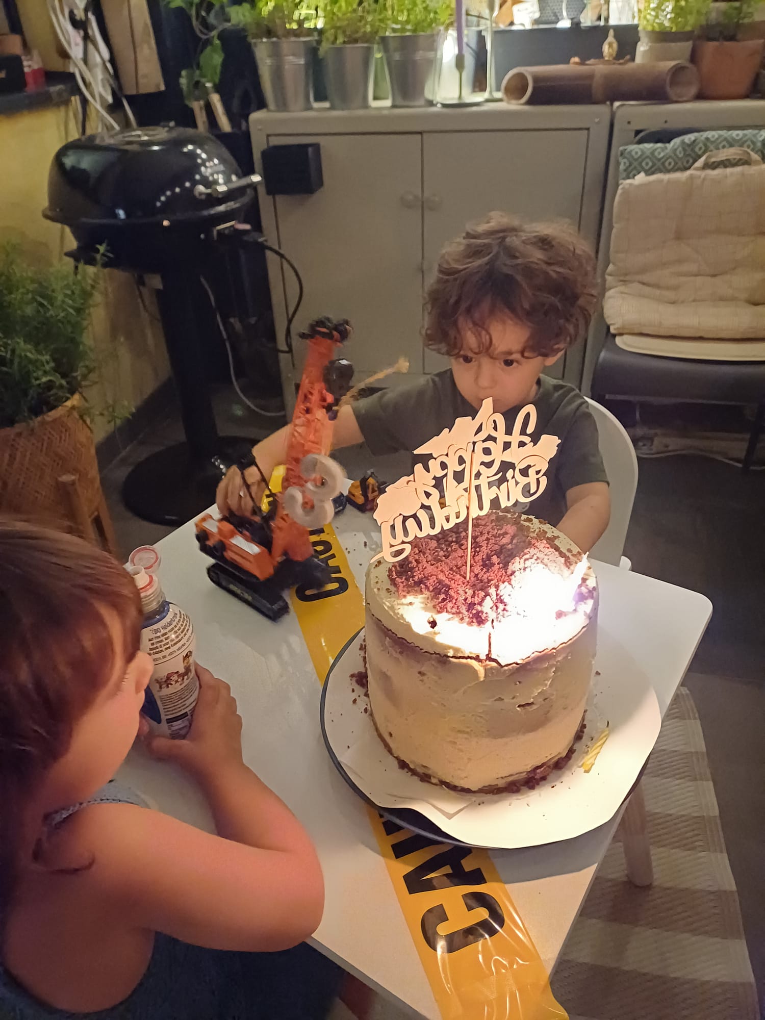 Adrian with the construction crane at his birthday