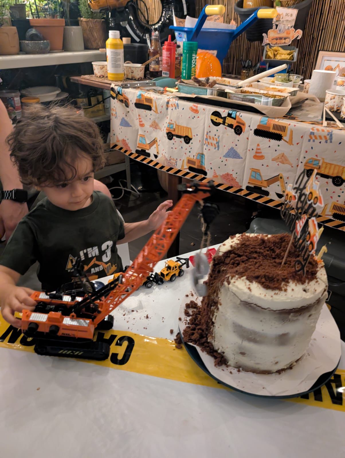 Adrian blowing birthday candles